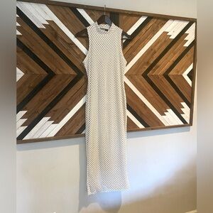 Formfitttd madi dress. White hole lace with nude liner. Size US 10.